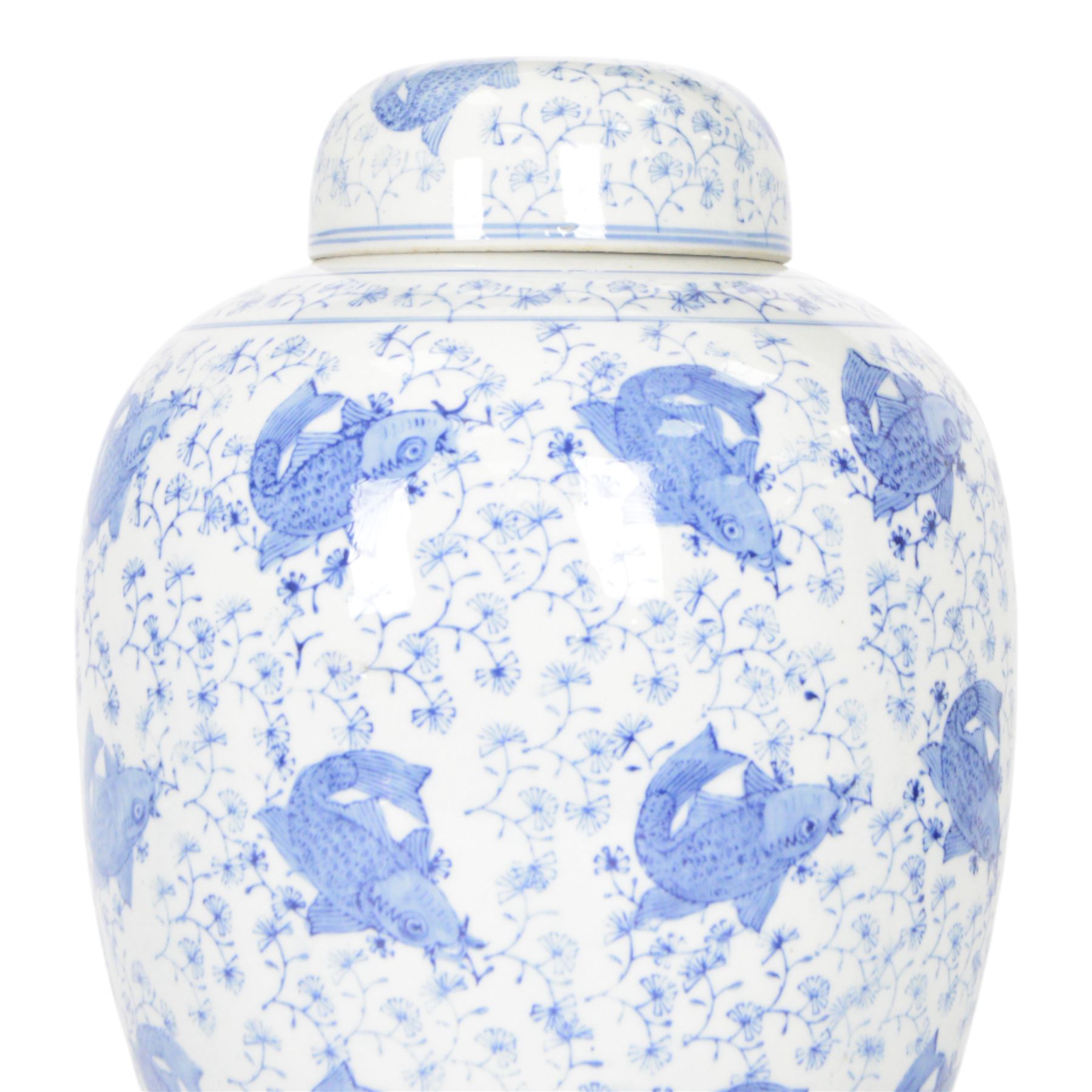 Blue and white ginger jar, decorated in a repetitive pattern of fish swimming amongst dense clusters of aquatic foliage, H40cm