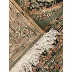 Pair of Bangladeshi olive ground runner rugs, machine-made with 100% jute pile, each with three central diamond-shaped medallions with intricate floral motifs, the field decorated with scrolling floral designs, bordered by stylised floral patterns 