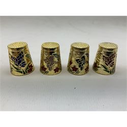 Twenty cloisonné thimbles, decorated with birds, flowers, pigs and dragons