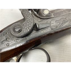 Mid-19th century percussion rifle by Geo. Forrest & Sons of Jedburgh No.844, 79cm octagonal barrel (approx .45 bore) with folding foresight, the lock plate with dolphin hammer finely engraved with a tiger and a stag, trigger guard engraved with hounds chasing a stag, figured walnut half stock with chequered grip and original ramrod 121cm overall; with framed photograph of original owner Dr. A.B. Dresser and archive of related ephemera including manuscript letter from the makers to Dr. Dresser regarding the sight specifications.
