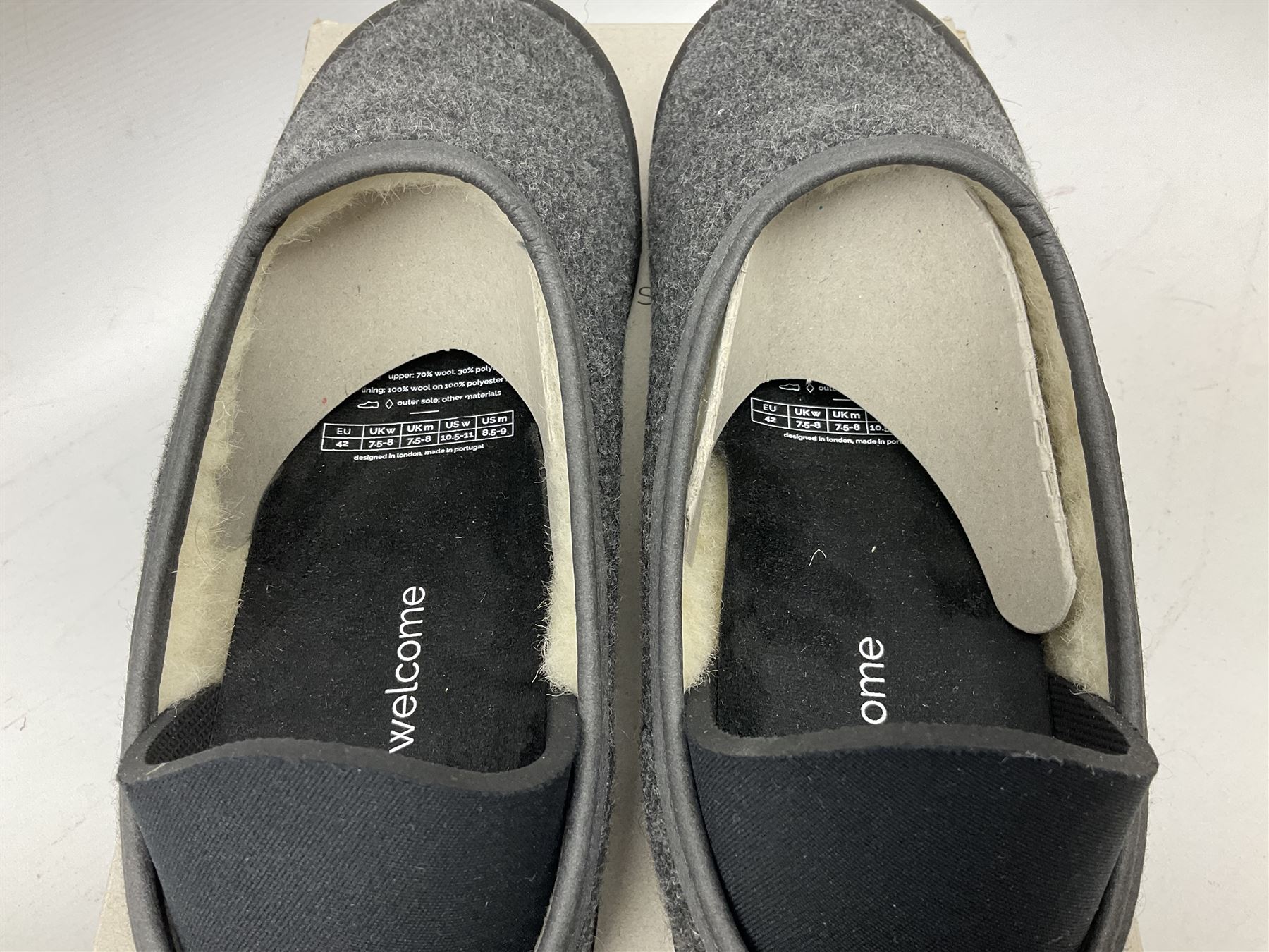 Two pairs of Mahabis slippers, comprising Mahabis curve grey and black slippers size EU42 and Mahabis classic grey and black slippers, both new in box