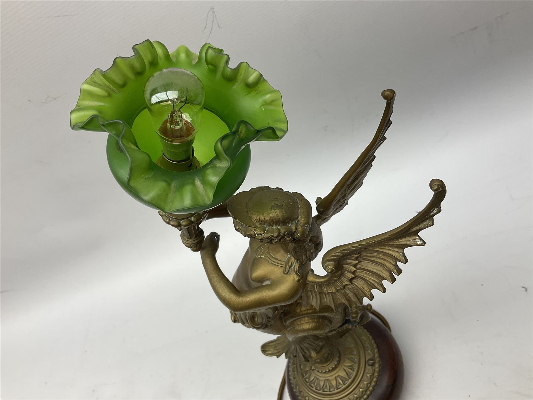 Victorian gilt bronze converted gas lamp in the form of  mythical winged mermaid upon a circular oak base, with a frilled green glass shade, H44cm