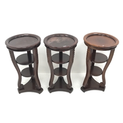 Three Classical style mahogany lamp tables, three carved shaped supports joined by two solid undertiers, D45cm, H83cm 