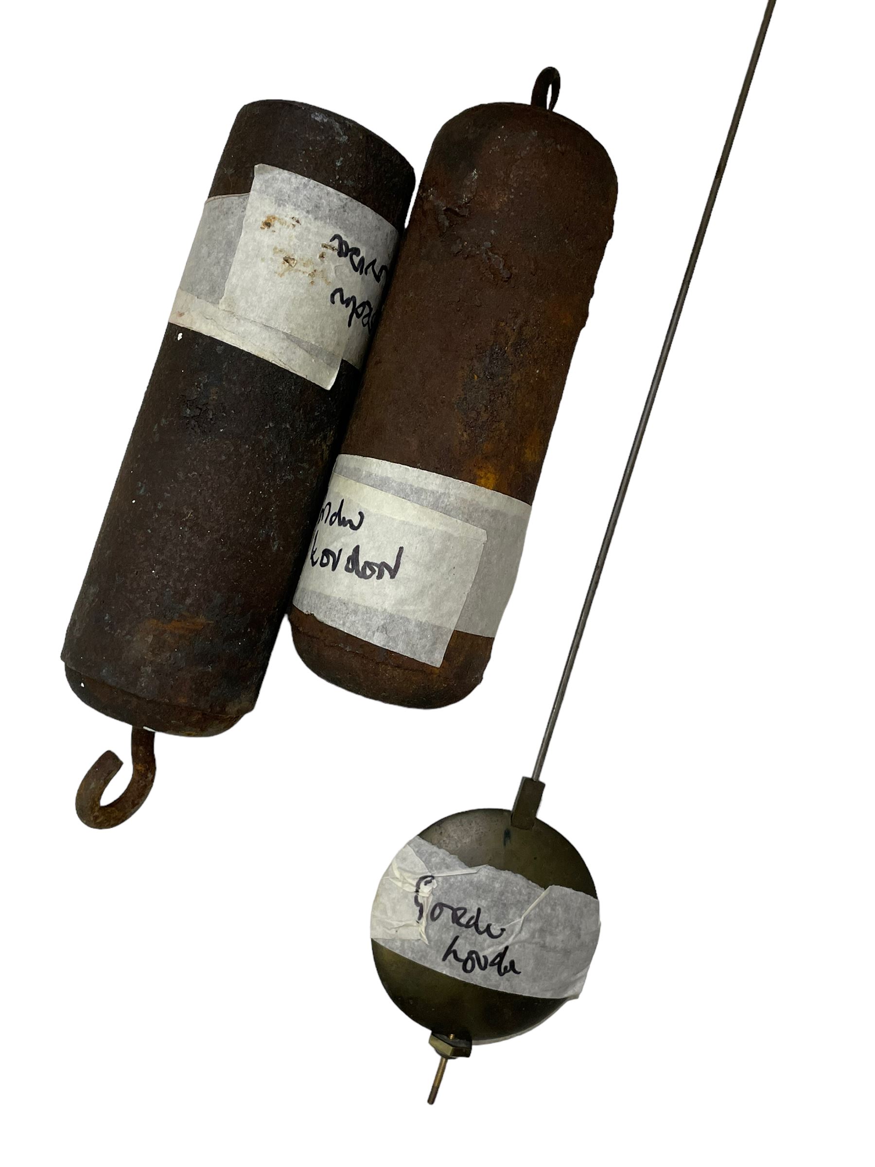 18th-century profusely carved oak longcase clock - with a pagoda pediment, upstands and carving, 
 break arch hood door flanked by reeded pilasters with brass capitals, trunk with canted corners and a spire topped door, square plinth with applied skirting, break arch brass dial with wheatsheaf engraving and cast cherub and crown spandrels, engraved break arch with the London clockmakers name John Gordin, silvered chapter ring with Roman numerals, five minute Arabic's, minute and quarter hour tracks, matted dial centre with ringed winding holes, square date aperture and seconds ring, dial pinned to a five pillar movement with inside countwheel striking, striking the hours on a cast bell. With weights and pendulum. John Gordin, is possibly a mis-spelling or phonetic spelling of John Gordon, of London, who worked from Ludgate Street in the parish of St. Gregory by St. Pauls. Apprenticed in 1689 and died in 1732 when his will was proven.
