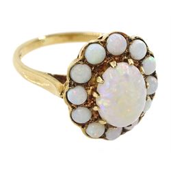 9ct gold oval and round opal cluster ring, hallmarked, central opal approx 1.00 carat