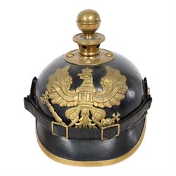WWI Prussian EM M1895 artillery Pickelhaube, circa 1895, the black leather skull with bras...