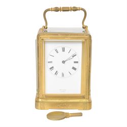 Late 19th century French 8-day brass cased carriage clock, Henry Marc of Paris, the gorge case with swing handle and four bevelled glass panels, white enamelled dial with Roman numerals and minute markers and steel hands, the two train movement with platform lever escapement, hour striking on a bell, with key
