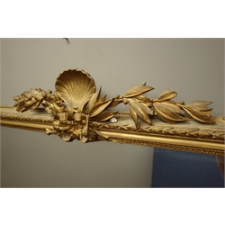  Large late 19th century gilt wood and gesso framed mirror, shell and foliage pediment with ribbon, husk moulded corner brackets, 138cm x 168cm  