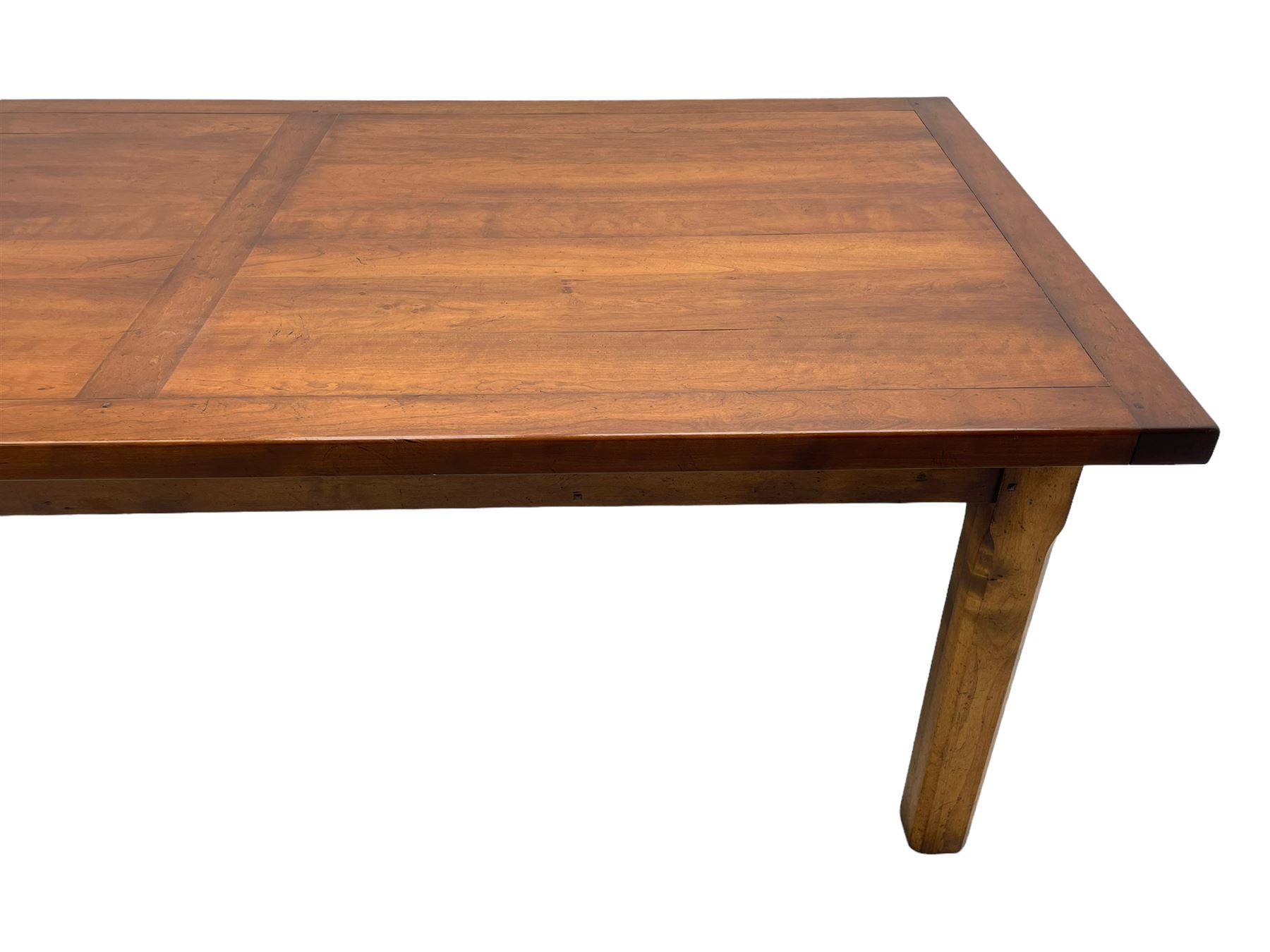 Contemporary French farmhouse design cherry wood dining table, rectangular bordered top on square chamfered supports 
