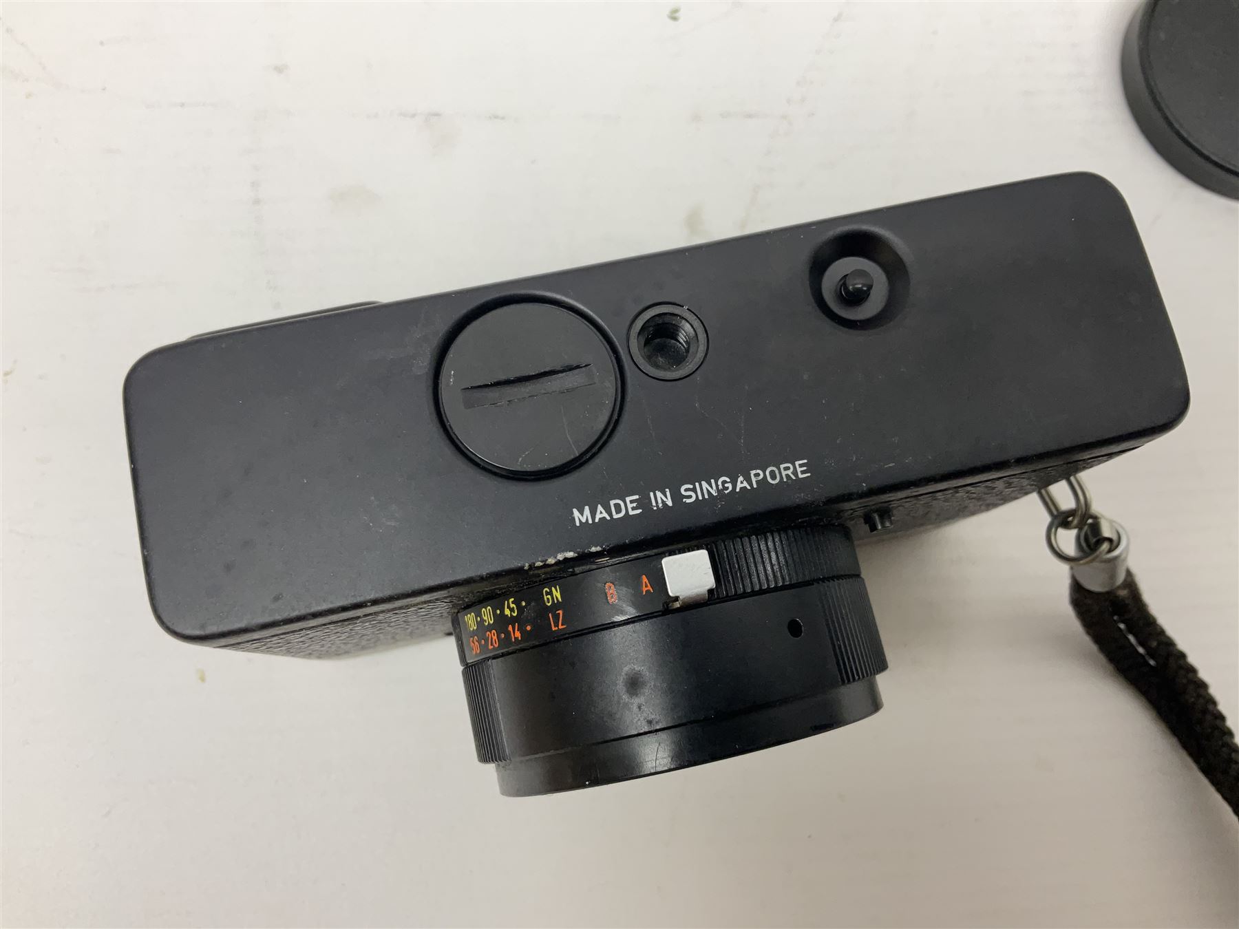 Three Rollei cameras, to include a Rollei 35 LED camera, with Triotar 3.5/40 lens and two Rollei XF 35 cameras, each with Sonnar 2.3/40 lenses