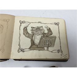 Two scrapbook/sketch albums, a pair of Lucina opera glasses in case and a cheroot holder 
