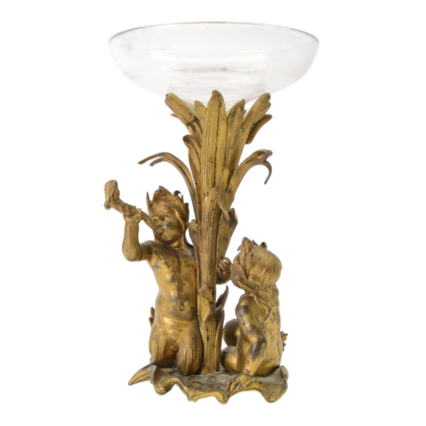 19th century French bronze ormolu centrepiece, the stem cast in relief with reeds holding aloft a glass bowl, supported by two mermen upon a naturalistic base, including bowl H38cm