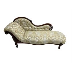 Victorian mahogany chaise longue, scrolled back with pierced and floral carved decoration, champagne foliate pattern fabric, cabriole feet with brass and ceramic castors