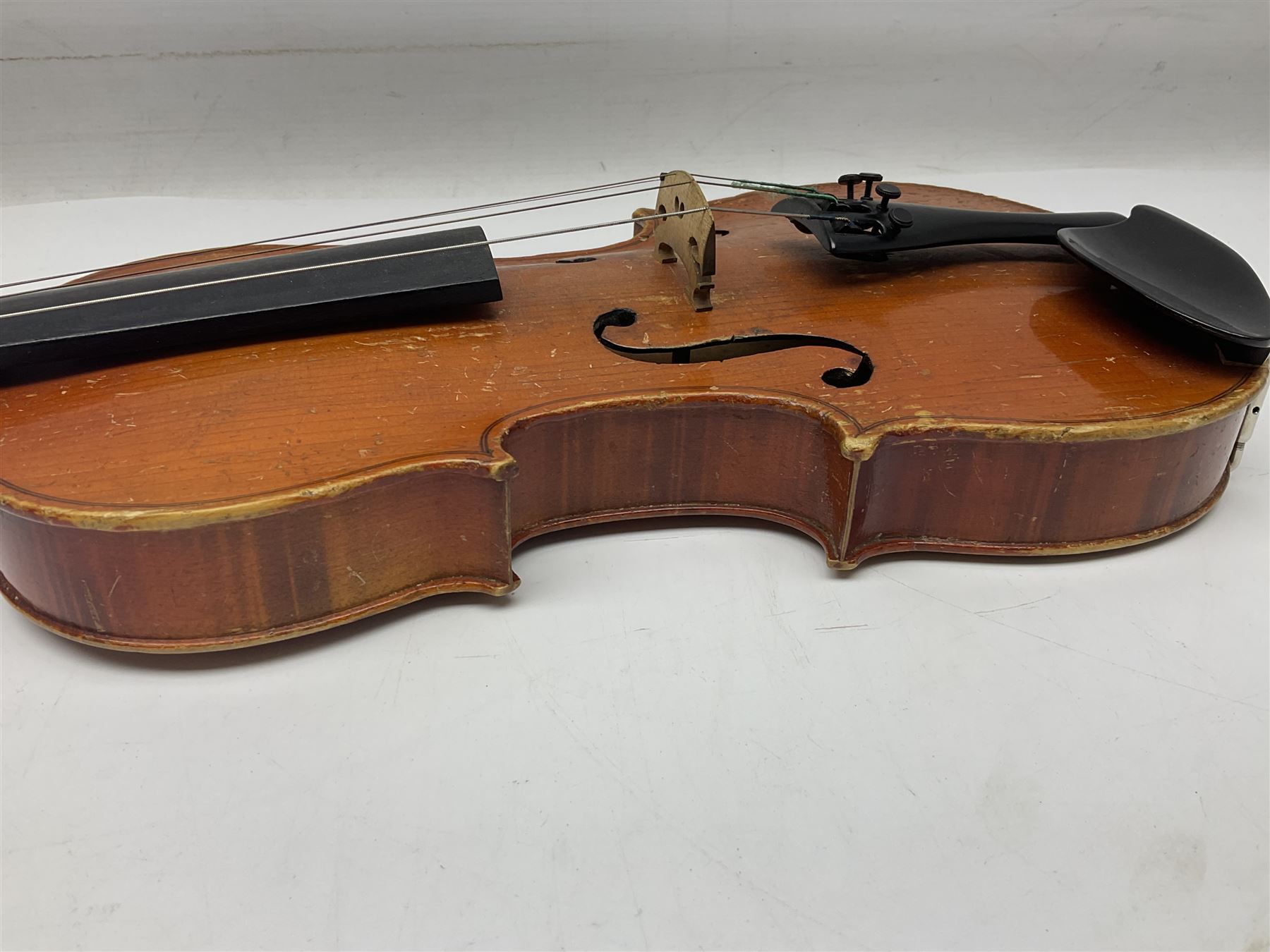 Two three-quarter size violins - German Saxony with 34cm one-piece maple back and ribs and spruce top; L56cm overall; and Hungarian with 34cm two-piece maple back and ribs and spruce top; L56cm overall; each in carrying case with bow (2)