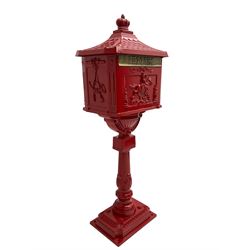 Traditional design post box - red painted aluminium with horse and rider design, over pedestal base with mounting bracket, fitted with letter slot and locking cupboard door
