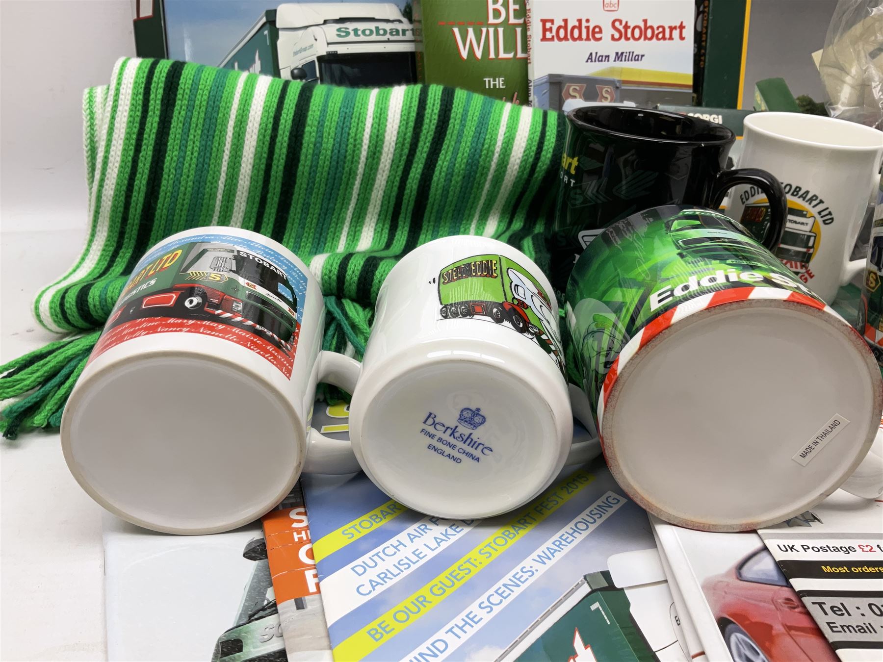 Eddie Stobart - accessories, memorabilia and promotional merchandise including Corgi Self Assembly Model Transport Depot and Five Figures Set; scarf; slippers; mugs and beakers; coasters; note book; books etc