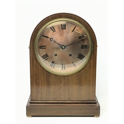  Large Edwardian inlaid mahogany arched top bracket clock with silvered Roman dial, twin train movement striking the quarter hours on two coils, brass bun feet, H41cm  