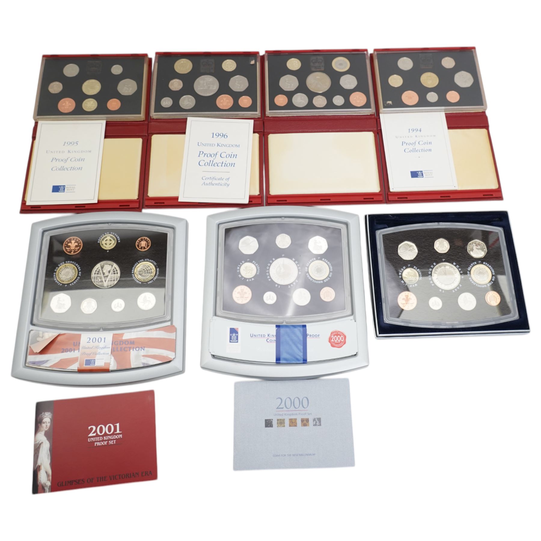 Four The Royal Mint United Kingdom proof coin collections, dated 1994, 1995, 1996, 1997, all cased, and three The Royal Mint United Kingdom proof sets, dated 2000 (2) and 2001, all cased