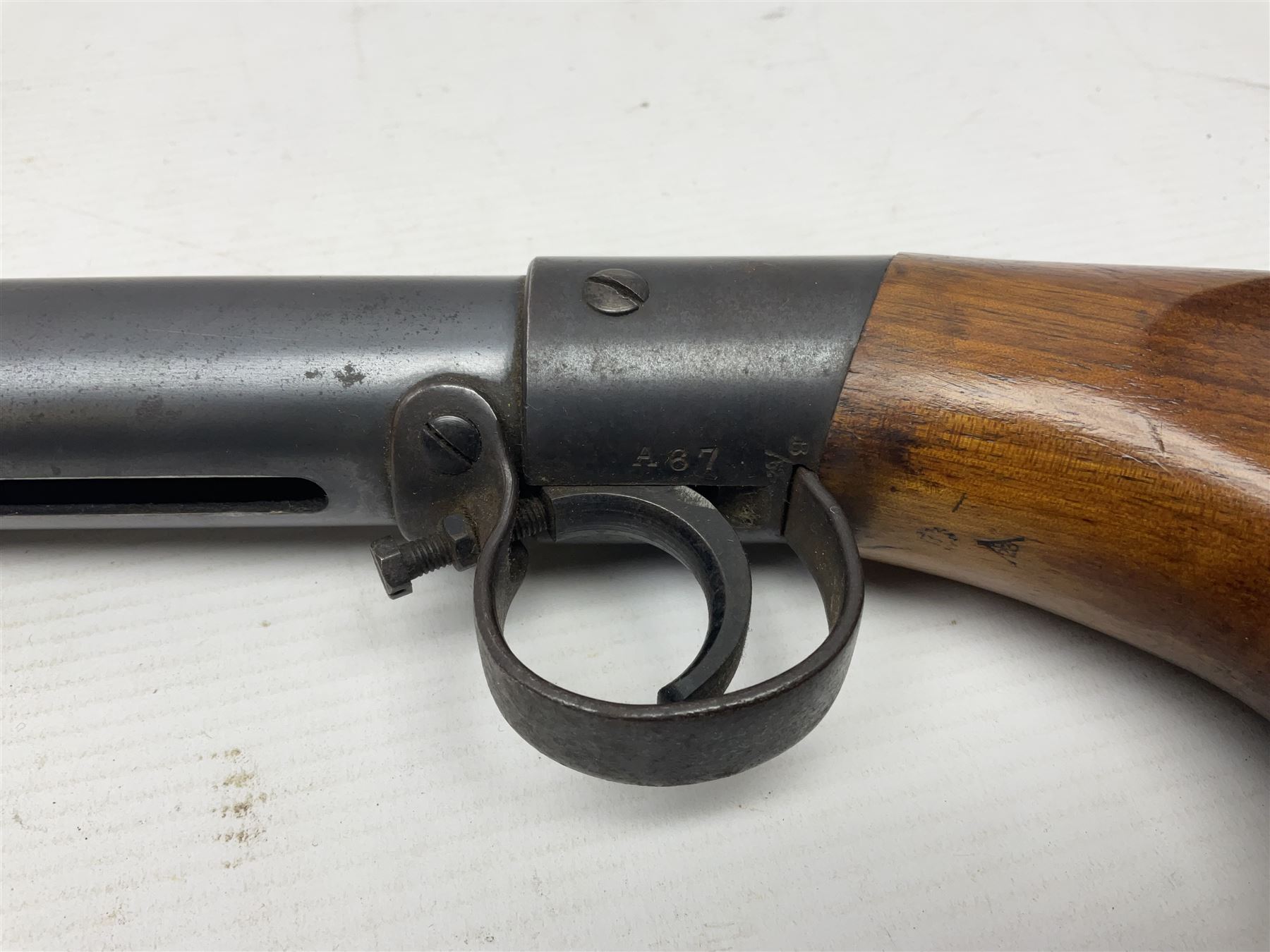 Early 20th century BSA Standard .177 Cal. Air Rifle (No.1), early A prefix number A67, with blued finish, top-loading, push-button underlever action, walnut semi-pistol grip stock with chequered BSA logo L101cm overall; with contemporary canvas case; NB: AGE RESTRICTIONS APPLY TO THE PURCHASE OF AIR WEAPONS.
