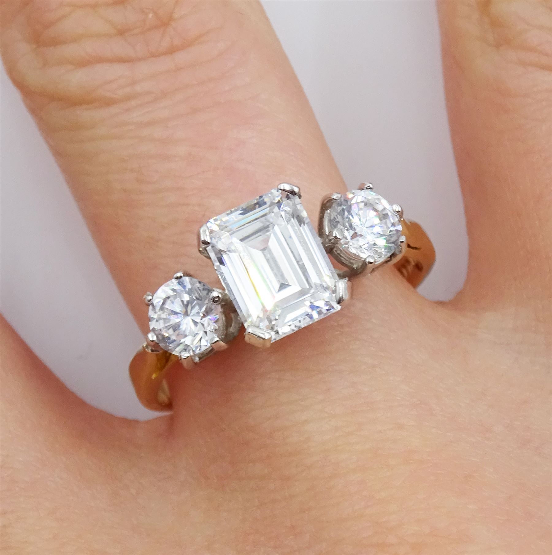 14ct gold three stone emerald and round cut cubic zirconia ring, hallmarked 