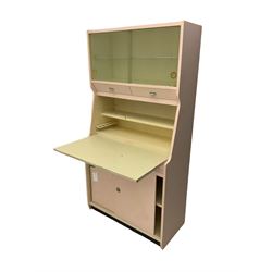 Hygena - mid-20th century painted kitchen cabinet, glass sliding doors, above fall front preparation surface, two sliding cupboards to base