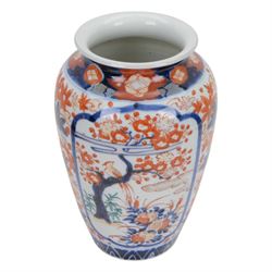 Japanese Imari dish, with scalloped edge, the internal decoration with panels of blossoming branches and a central bird, together with another imari bowl and three vases, scalloped dish H7cm