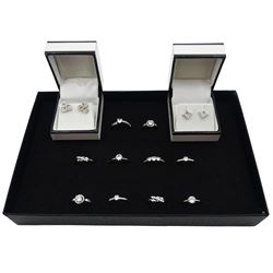Ten silver cubic zirconia dress rings and two pairs of cubic zirconia stud earrings, all stamped 925 (12)