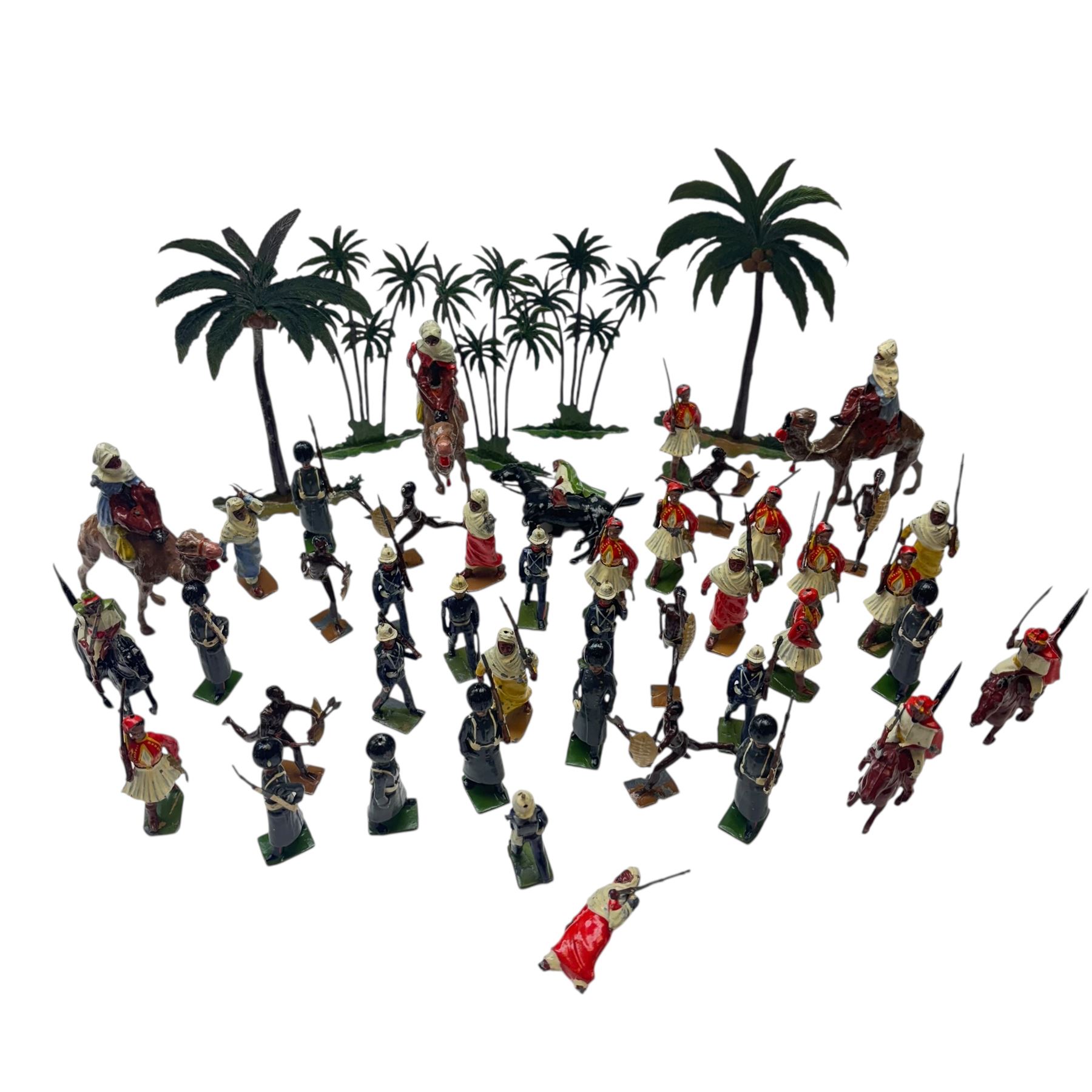 Britains lead figures circa 1930, comprising eight 'Grenadier Guards', seven 'Royal Marines', eight pre-war 'Greek Evzones', eight 'Zulu Warriors', six marching 'Bedouin Arabs' and two on horseback, five 'Arabs of the Desert' including two on horseback and three mounted on camels and five palm trees