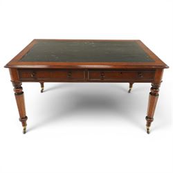 Mid Victorian four drawer mahogany partners' writing table, with leather inset top with moulded edge, with two frieze drawers to either side, on turned supports terminating in castors