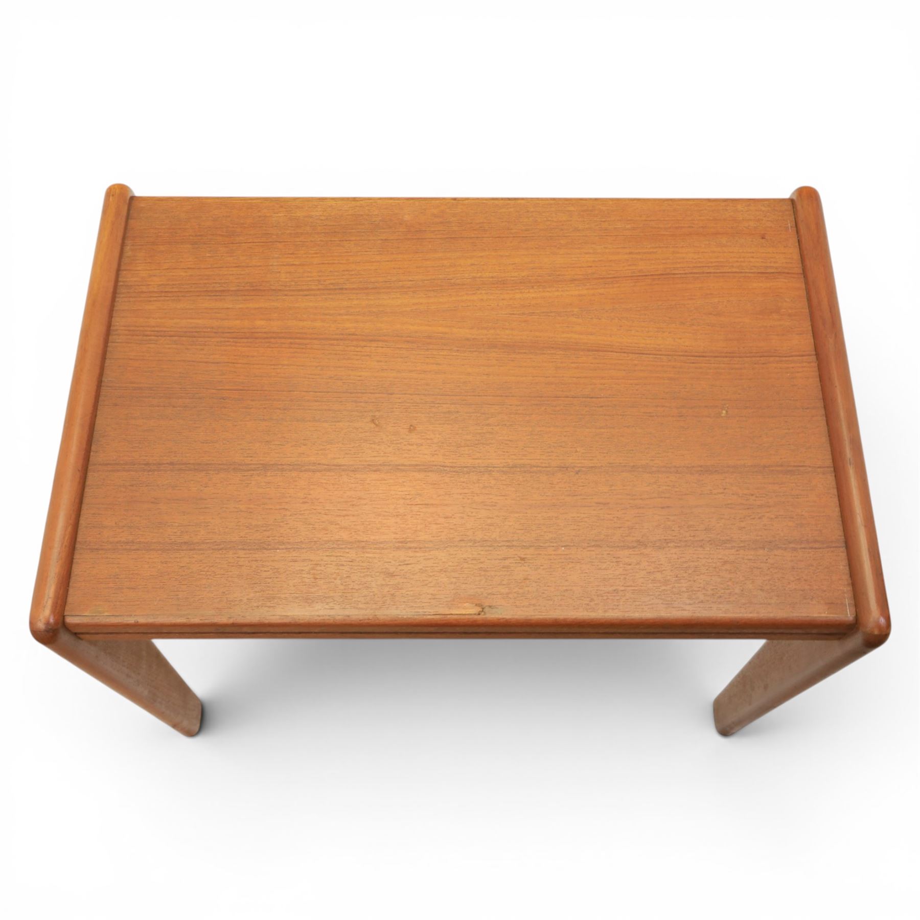 A pair of Nathan 'Highback Carvers' and a 20th century nest of teak tables, (Tables W65cm, D38cm, H49cm)
(Carvers W57, H97)