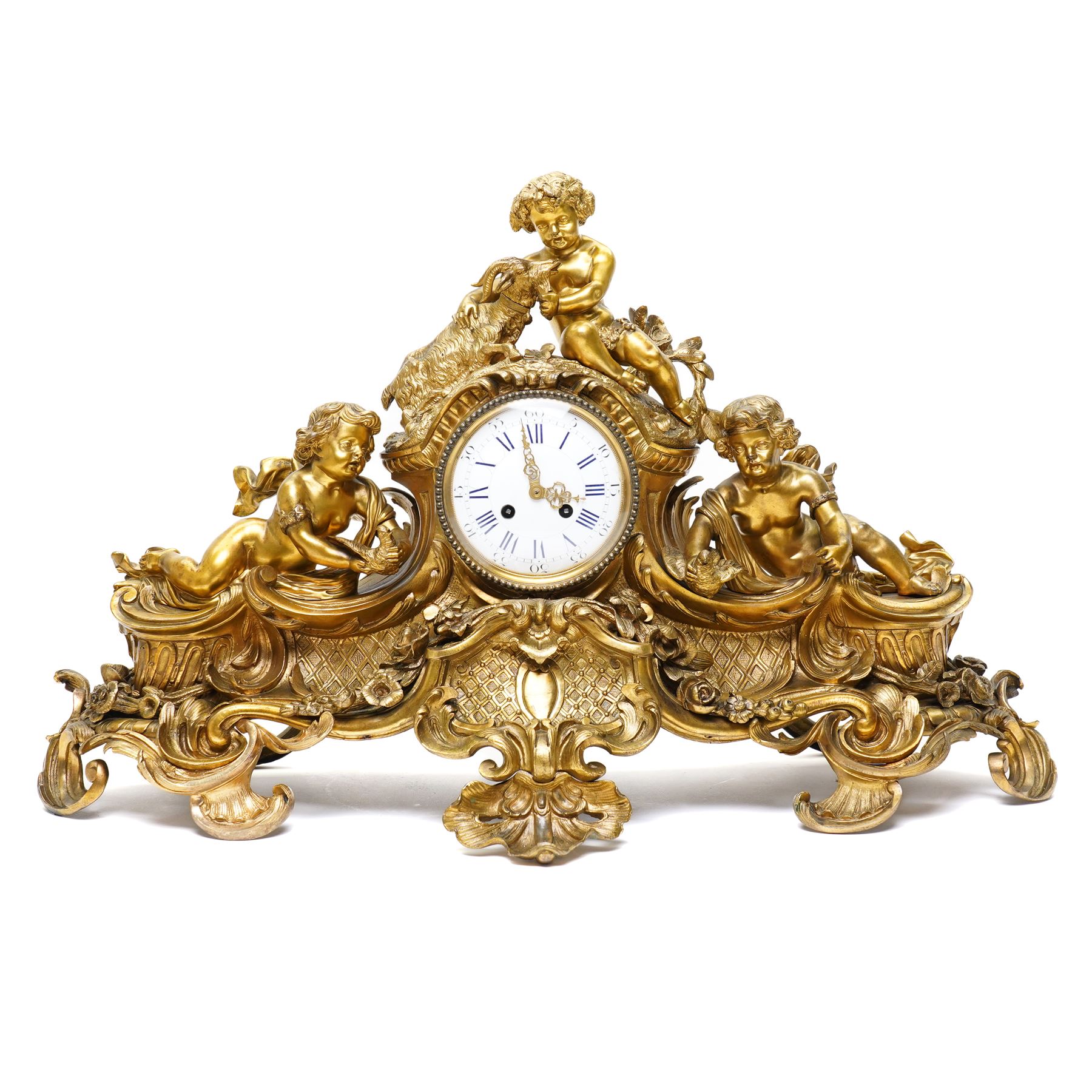 French-large late 19th-century 8-day Louis XV style gilt bronze mantel clock, with a cast rococo style case, elaborate C-scrolls, shells, and floral sprays, surmounted by a seated putto and goat symbolising pastoral love, flanked by two further seated putti on a scrolled foliate base, 5