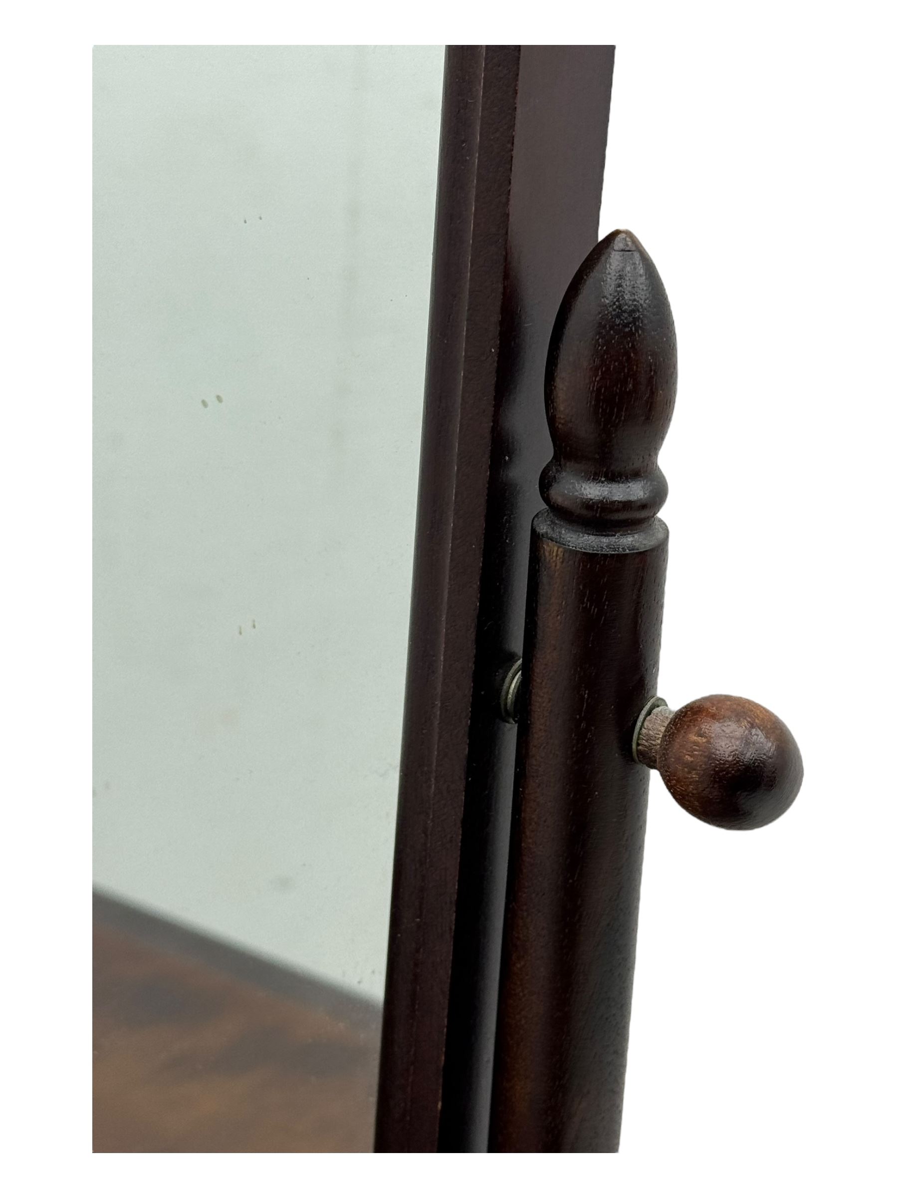Stag Minstrel - mid-20th century mahogany dressing chest, rectangular top over three short and two long drawers, on bracket feet; matching swing mirror on turned supports