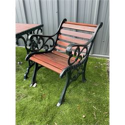 Painted cast iron and wood slated table and two chairs  - THIS LOT IS TO BE COLLECTED BY APPOINTMENT FROM DUGGLEBY STORAGE, GREAT HILL, EASTFIELD, SCARBOROUGH, YO11 3TX