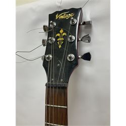 Vintage VS6M Reissued Series six string electric guitar, with solid body in cherry red finish, in carrying case, guitar L103cm