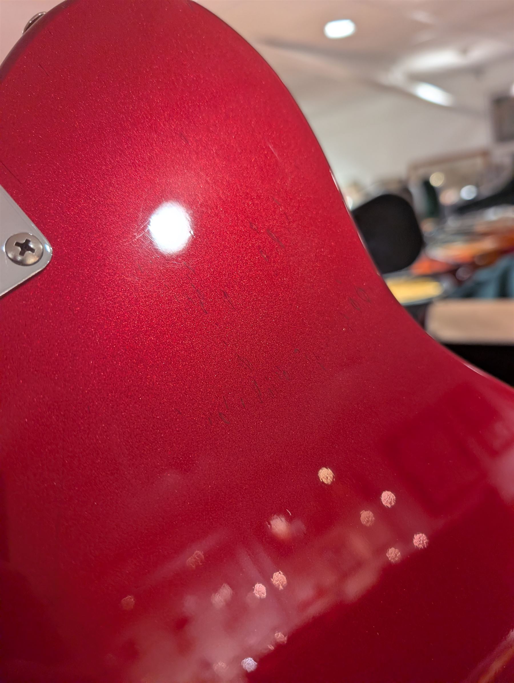 Fender Telecaster electric guitar, serial no. T021384 made in Japan c.1994, with Candy Apple Red body, white scratch plate and maple neck, guitar L98cm