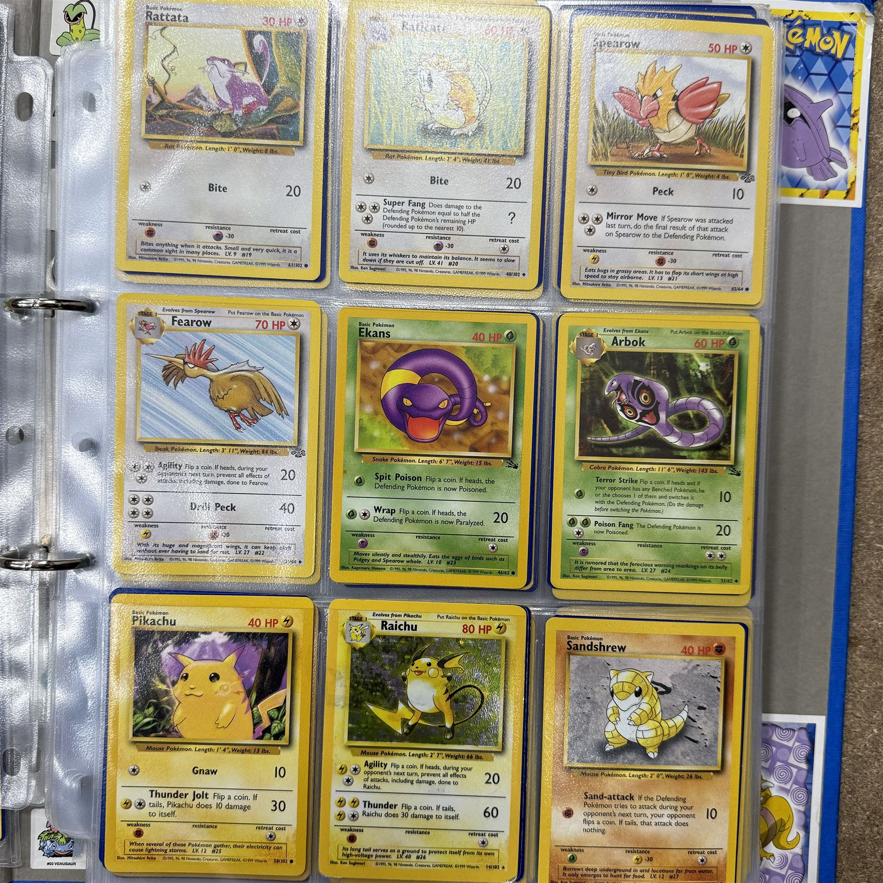 Collection of approximately 400 Pokemon trading cards, mostly 1999 Wizards Pokemon cards to include 1st Edition Dark Gyarados holo 8/82, Dark Charizard 4/82 holo and 21/82 non holo, Dark Blastoise 3/82 holo and 20/82 non holo, Dark Raichu holo 83/82, Dark Dragonite 22/82, eleven first edition cards, Japanese cards, Trainer cards, etc, together with an album of Pokemon the First Movie cards, a voice actor signed copy of Pokemon: The First Movie Animation Comics Mewtwo Strikes Back #1, 5305/8000 with certificate of authenticity with comics 2, 3 and 4 