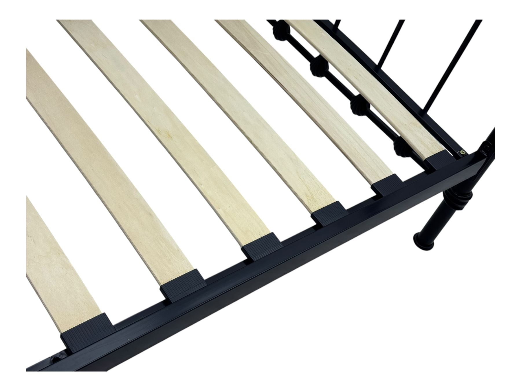 Contemporary Victorian revival black metal day bed, featuring arched back and sides with turned finials and spindle rails, complete with single 'OTTO' mattress