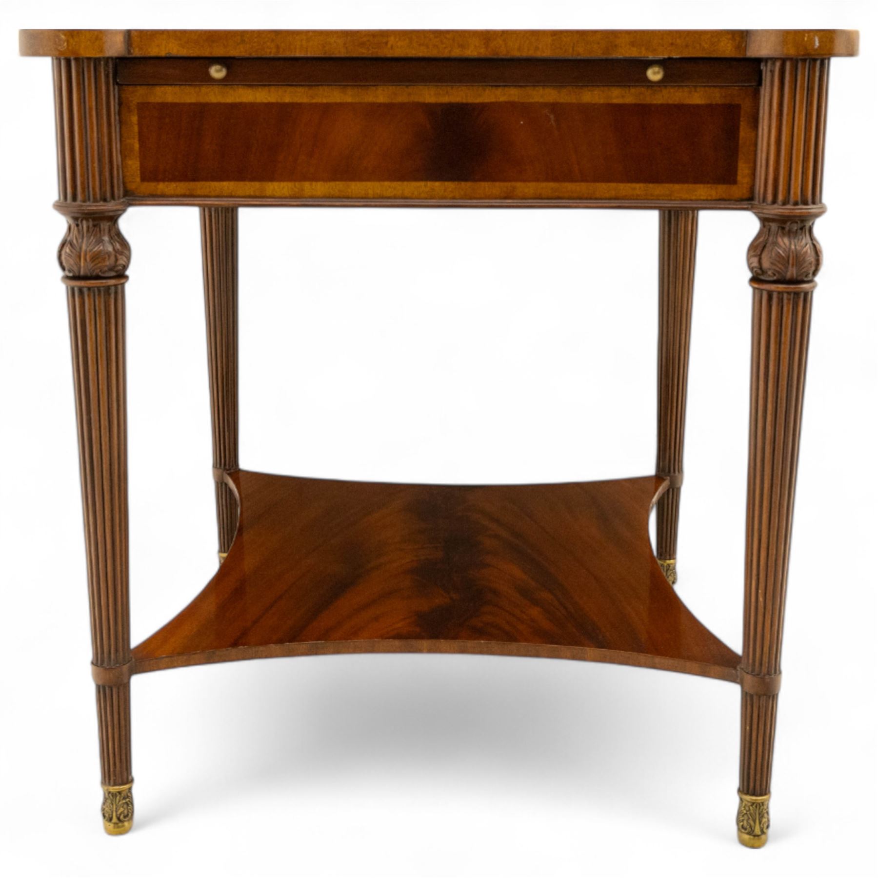 Maitland Smith - Pair of mahogany side tables, the rectangular top with rounded corners, the top edge inlaid with movingui wood, above two under-tier shelves, and frieze drawer, supported on stop-reed and acanthus foliate carved legs united by platform stretcher, raised on brass sabot foot caps