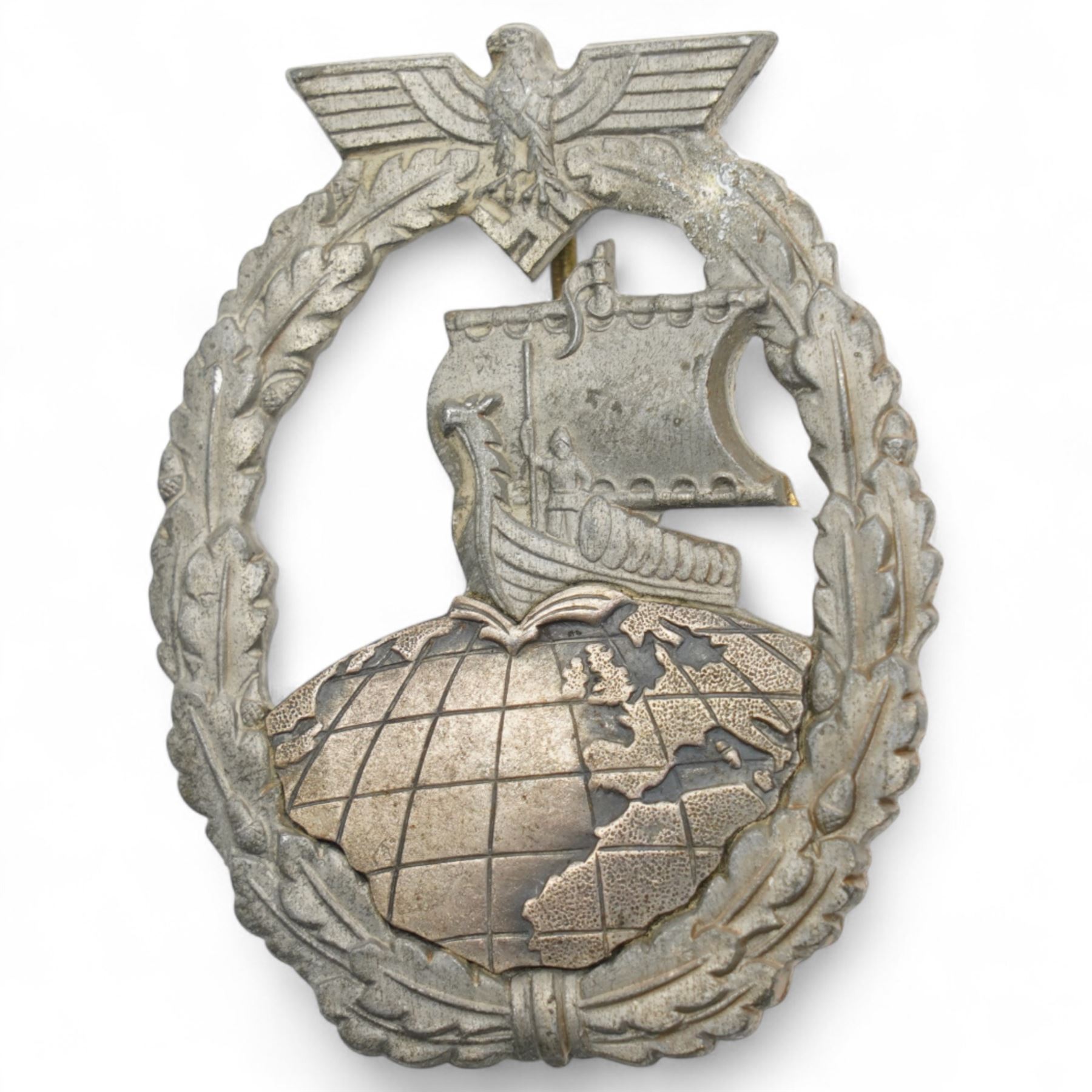 German Third Reich Krim shield arm badge 1941-1942, Auxiliary Cruiser badge and a WWI first class Iron Cross with field conversion (3) 