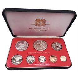 Two Papua New Guinea 1976 eight-coin proof sets, both cased with certificates