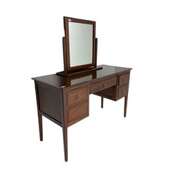 Hardwood kneehole dressing table or desk, fitted with five drawers, on square tapering supports, with swing mirror