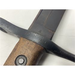 WW2 Italian Model 1891 bayonet with 30cm fullered blade; cross-piece marked PS 1941; in associated leather covered scabbard with frog L45cm overall