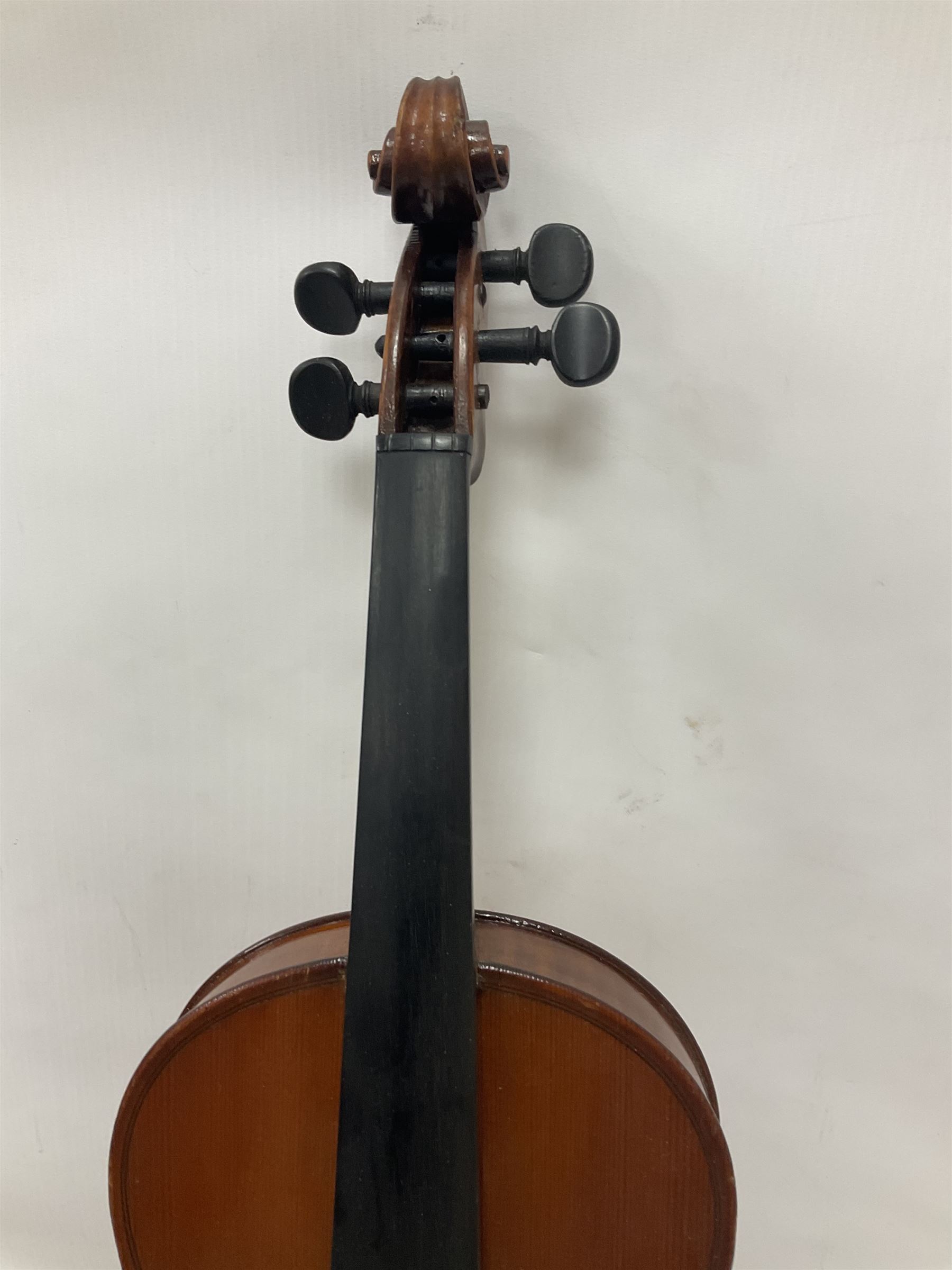 Four violins 1/8th size; half size with Nicolas Bertholini label; three-quarter size with Stradivarius copy label; and full size with Marquis De L'Air label (4)