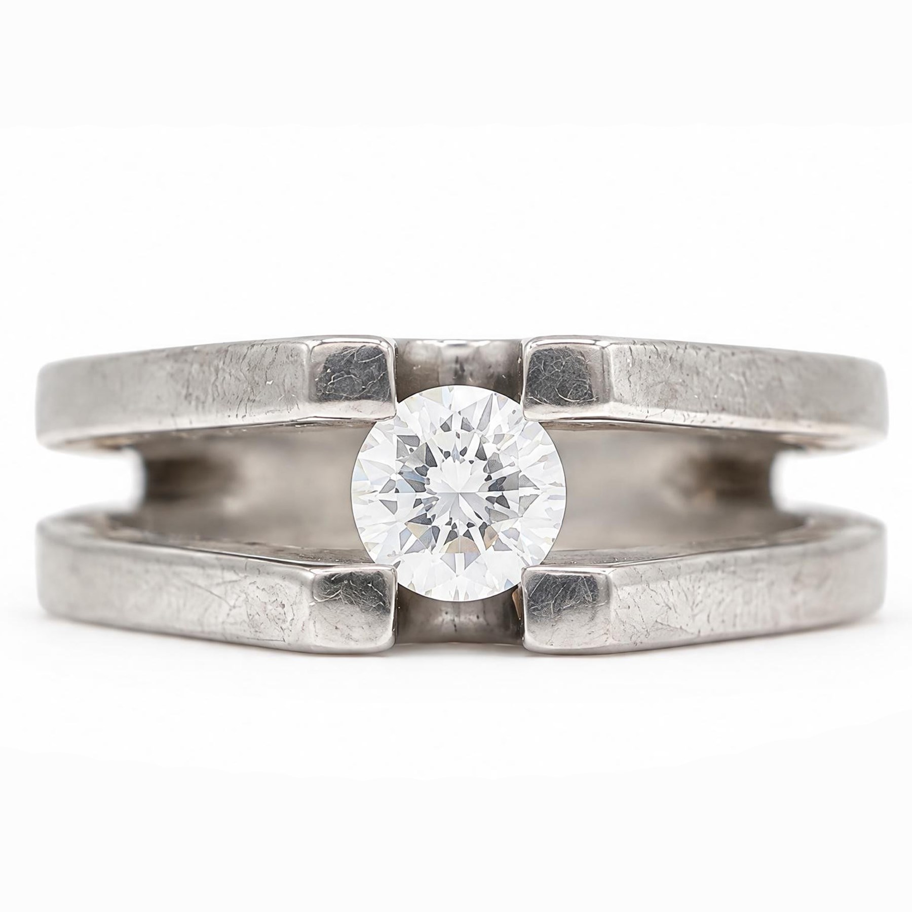 Titanium diamond ring, four claw set with a single round brilliant cut diamond of approx 0.45 carat