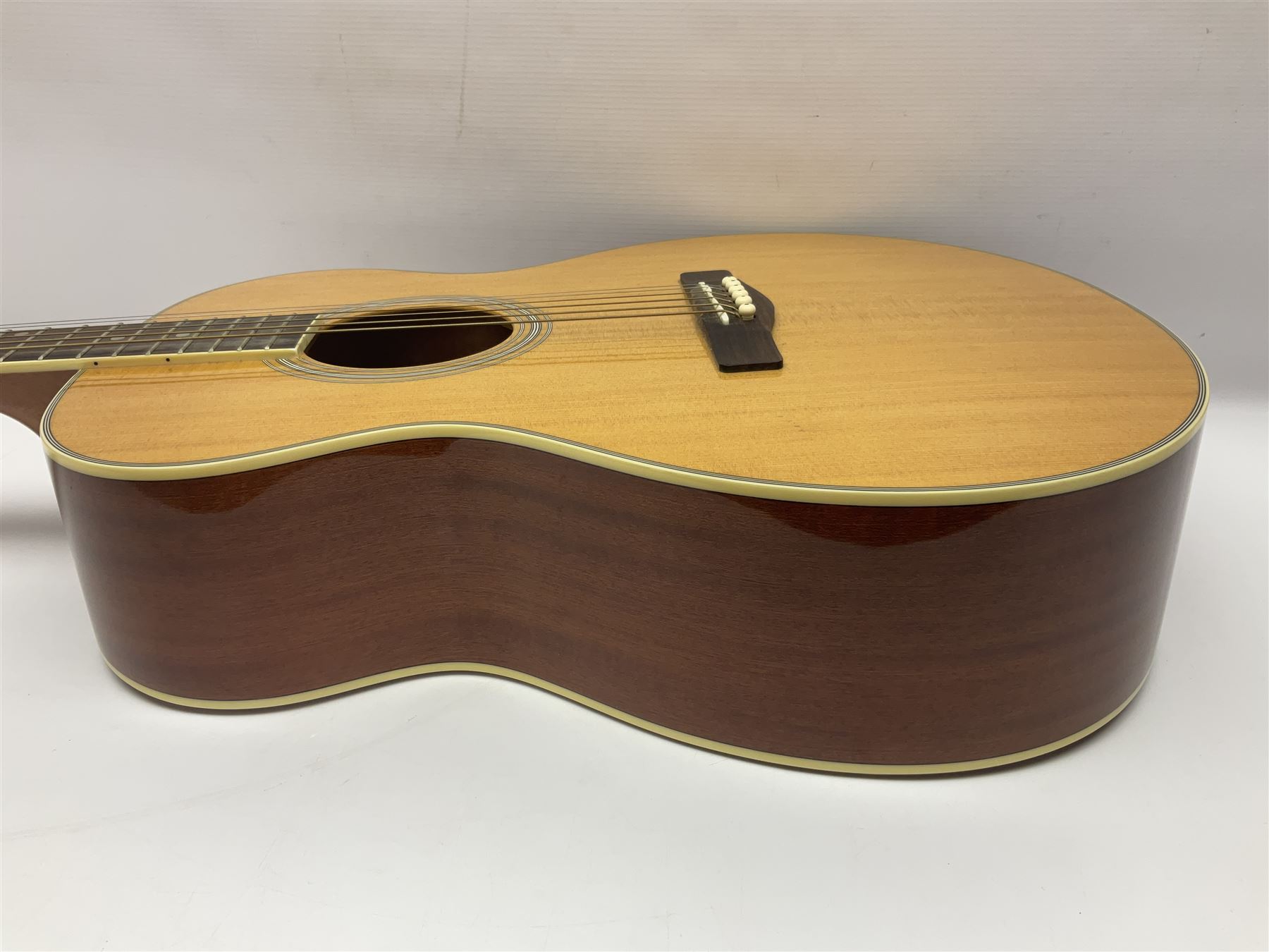 Woodstock model no.WHW41J203 acoustic guitar with mahogany back and sides and spruce top, serial no.2835 L102.5cm; in soft carrying case