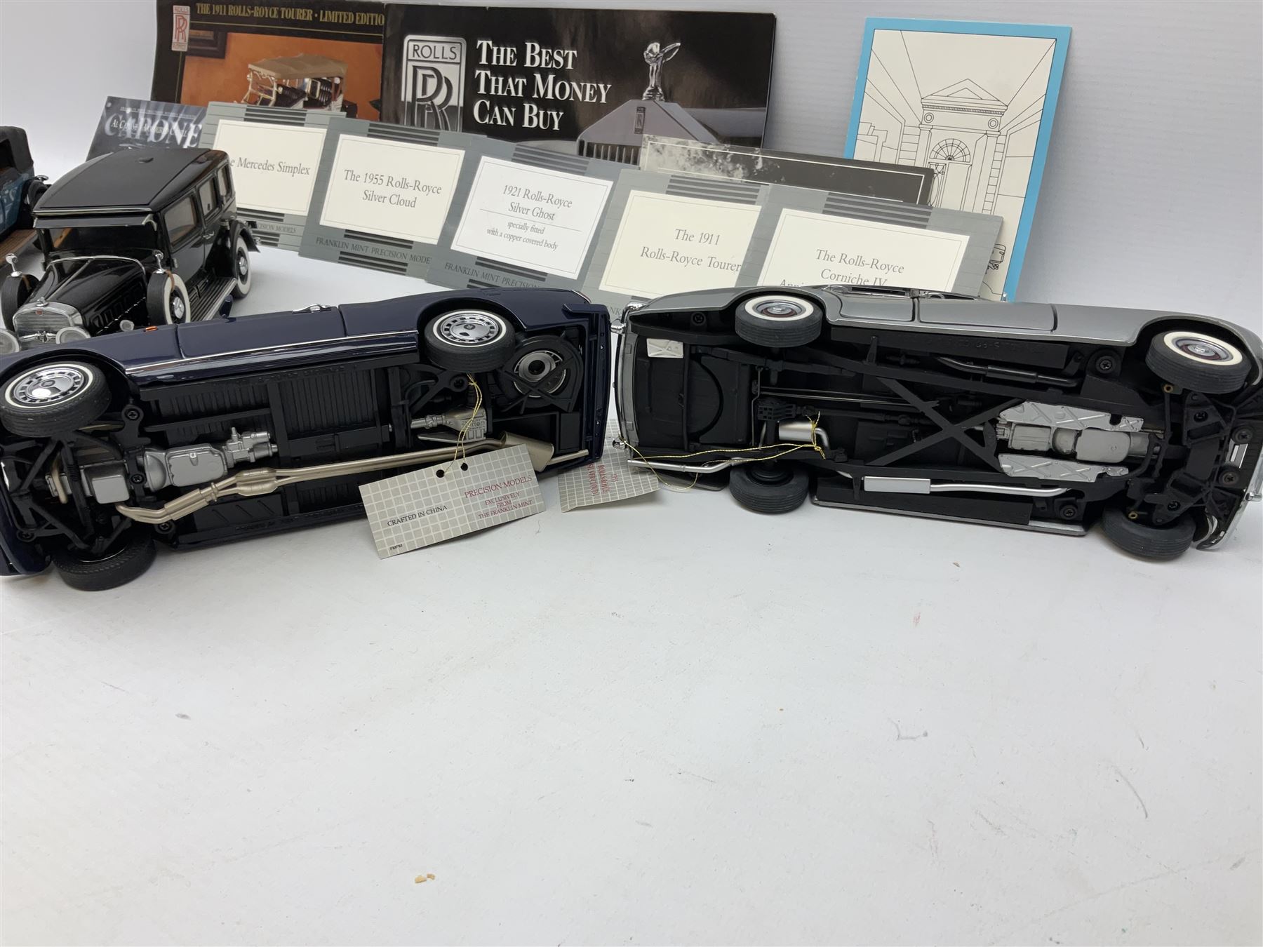 Eight Franklin Mint diecast models of cars, 1911 Rolls-Royce Tourer, The Rolls-Royce Corniche IV, The Mercedes Simplex, 1955 Rolls-Royce Silver Cloud, 1921 Rolls-Royce Silver Ghost, 1907 Rolls-Royce Silver ghost,1929 Rolls-Royce Phantom I,  and 1930 V-16 452 Cadillac Imperial Sedan, all with original tags attached