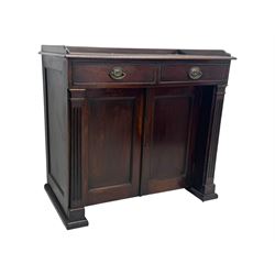 George III mahogany chiffonier or side cabinet, rectangular top with raised gallery and two frieze drawers, over double cupboard enclosing shelves, fluted side supports, raised on castors