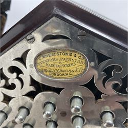 Wheatstone & Co McCann duet system concertina, no 25549, circa 1912, with fifty five metal buttons, hexagonal and chrome plated fretwork ends and six fold bellows, bearing plaque C Wheatstone & Co Inventors, Patentees & Manufacturers 15 West St, Charing X Rd, London; WC, with original case