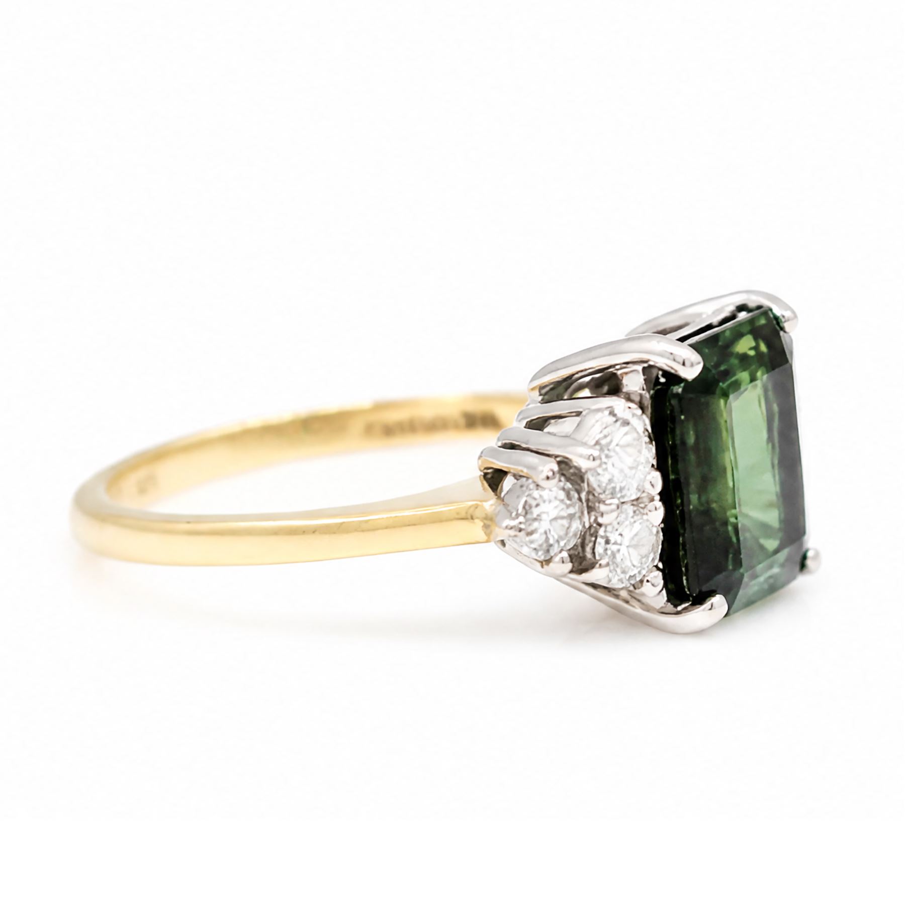 18ct gold green tourmaline and diamond ring, single octagonal cut tourmaline of approx 2.15 carat, with three round brilliant cut diamonds set either side, total diamond weight approx 0.30 carat