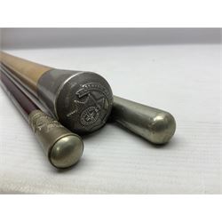 Three parade ground canes - malacca cane Coldstream Guards with plated mount engraved 'H.A. Myhan' L87cm; ebonised Church Lads Brigade 'Fight The Good Fight'; and mahogany stained Worcestershire Regiment (3)